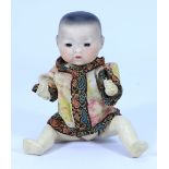 A small A.M Asian bisque head baby doll, German circa 1910,