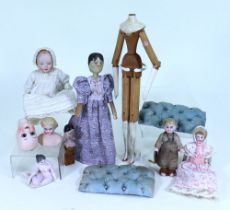 A collection of dolls, parts and related items,