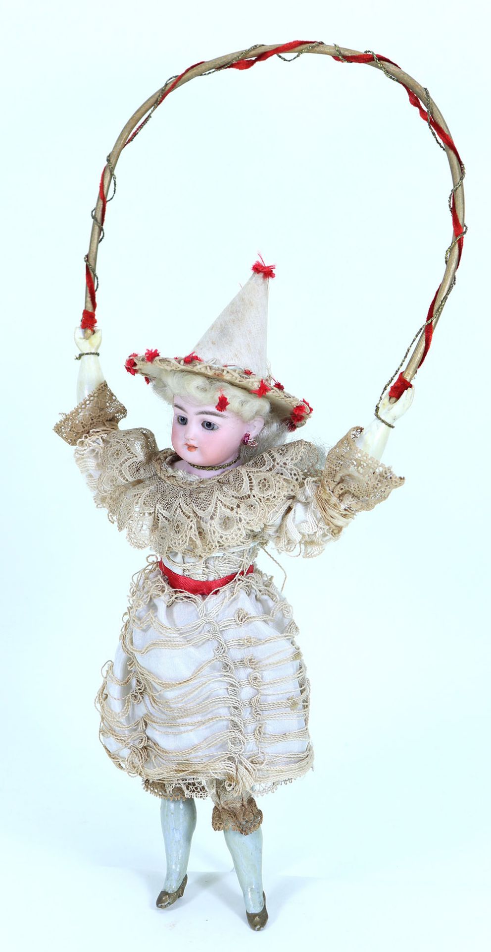 An all original Simon & Halbig 1010 shoulder head doll on swinging hoop, German circa 1910,