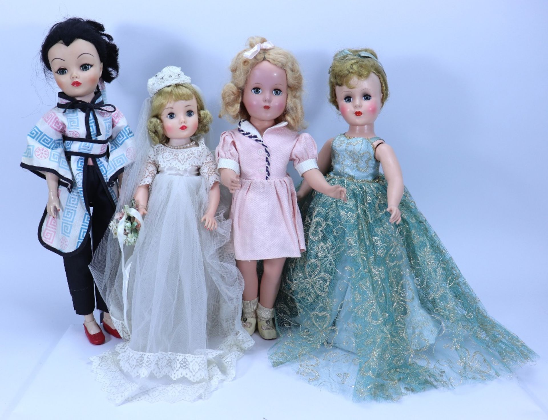 Three post war hard plastic dolls,