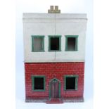 An early 20th century painted wooden box back Dolls House,