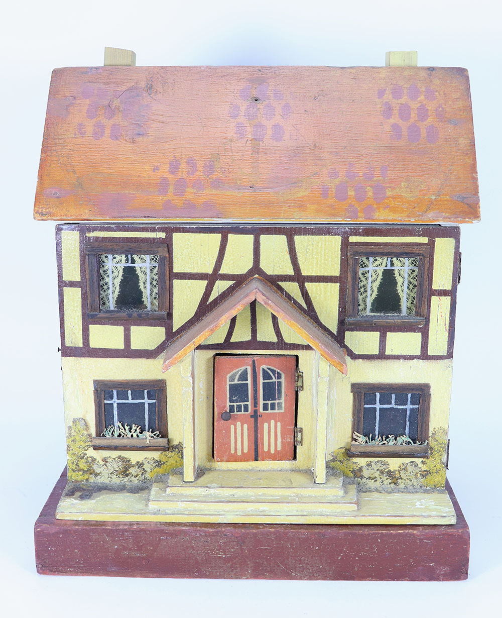 A D.H Wagner & Son painted wooden dolls house with contents, German 1920s-30s,