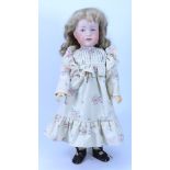 A reproduction Kammer & Reinhardt 114 bisque head doll, 1982