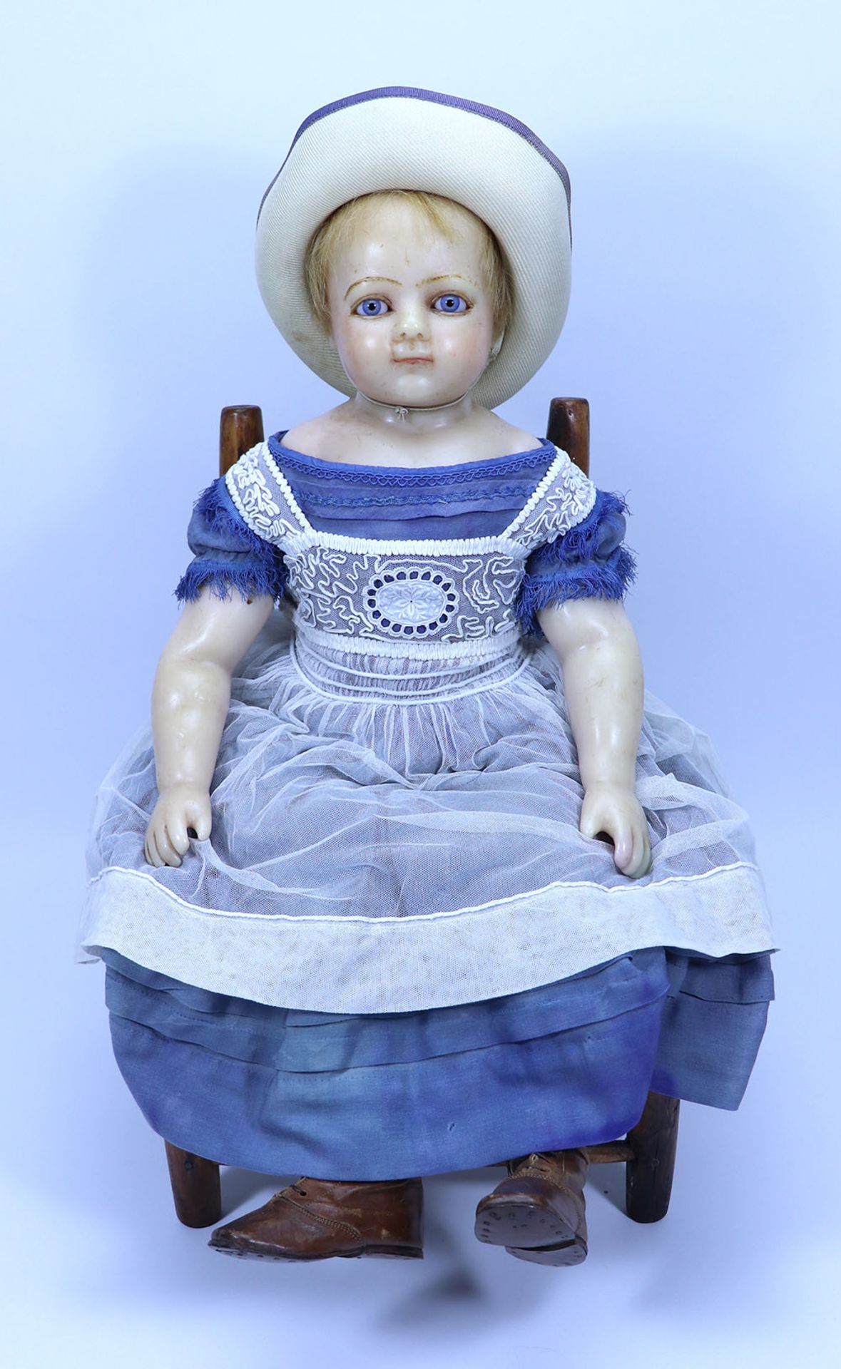 A large poured wax shoulder head doll probably Montanari, English circa 1860,