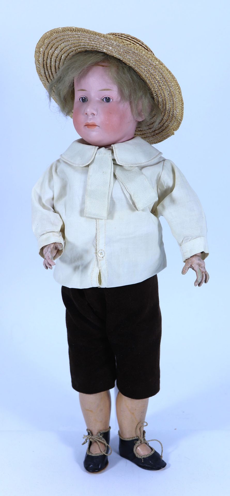 A Heubach ‘Pouty’ bisque head doll, German circa 1910,