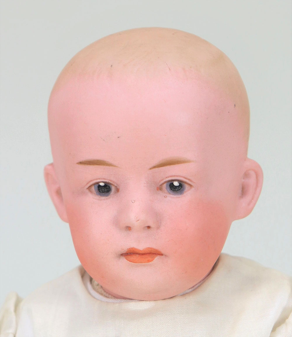 A Grebuder Heubach 7894 bisque head Pouty doll, German circa 1910,
