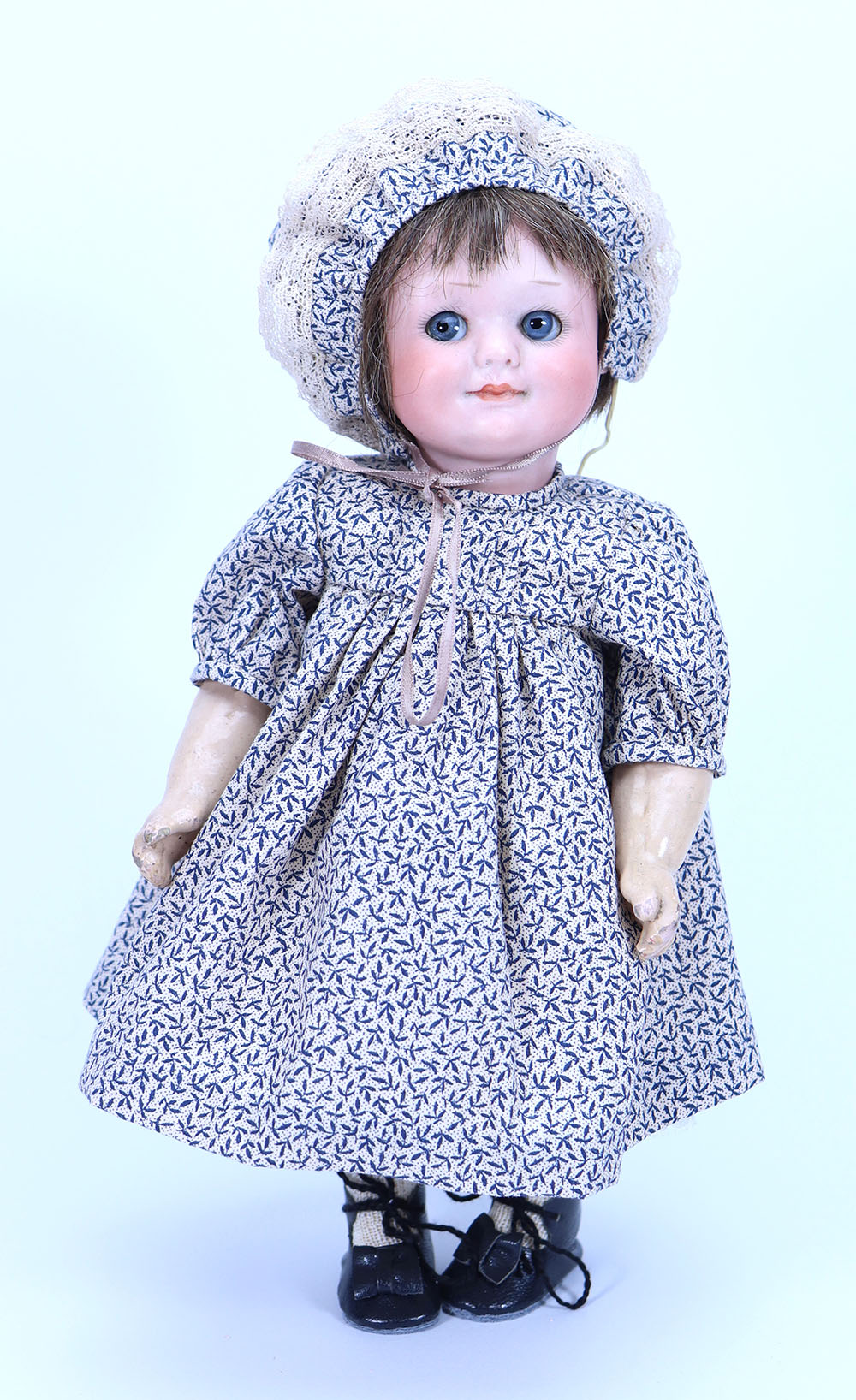 An A.M 323 bisque head ‘googly-eyed’ doll, German circa 1910,