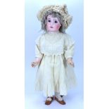 A good Steiner Figure A bisque head Bebe doll, size 15, circa 1890,