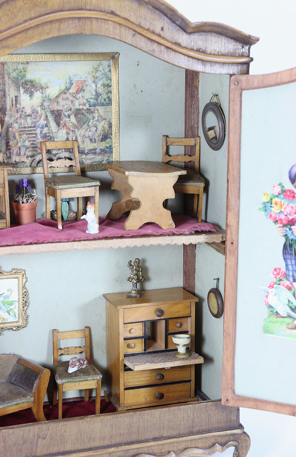 A charming wooden miniature dolls house in French armoire style, circa 1890, - Image 2 of 3