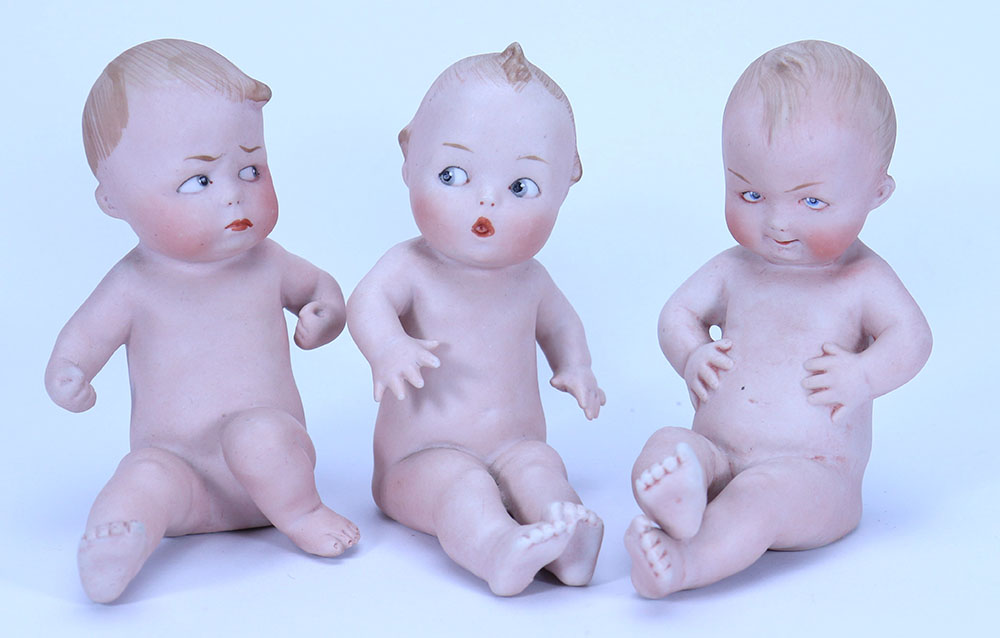 A set of three Gebruder Heubach all-bisque ‘Cutie’ dolls, German circa 1910,