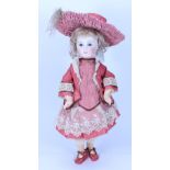 A beautiful early Premier Jumeau bisque head Bebe, French circa 1880,