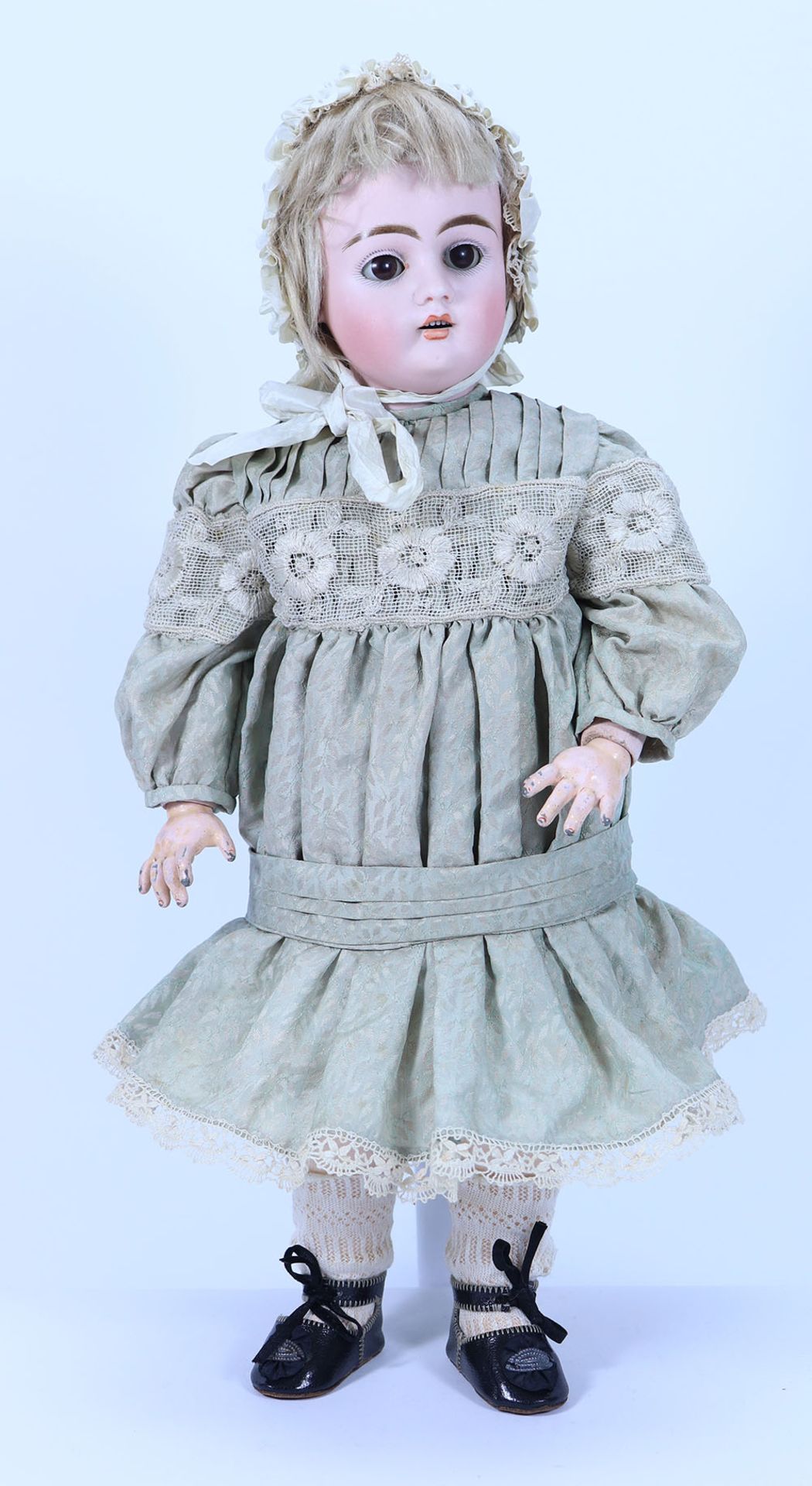 A 422 bisque head girl doll, German circa 1910,