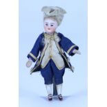 A miniature all-bisque boy doll in original clothes, French circa 1890,