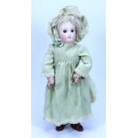 An early portrait Jumeau bisque head Bebe doll, French circa 1880,