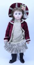 A reproduction Gina Saunders Jumeau Triste bisque head Bebe doll, 1989,
