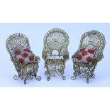 Three late 19th century decorative gilt metal wire arm chairs,