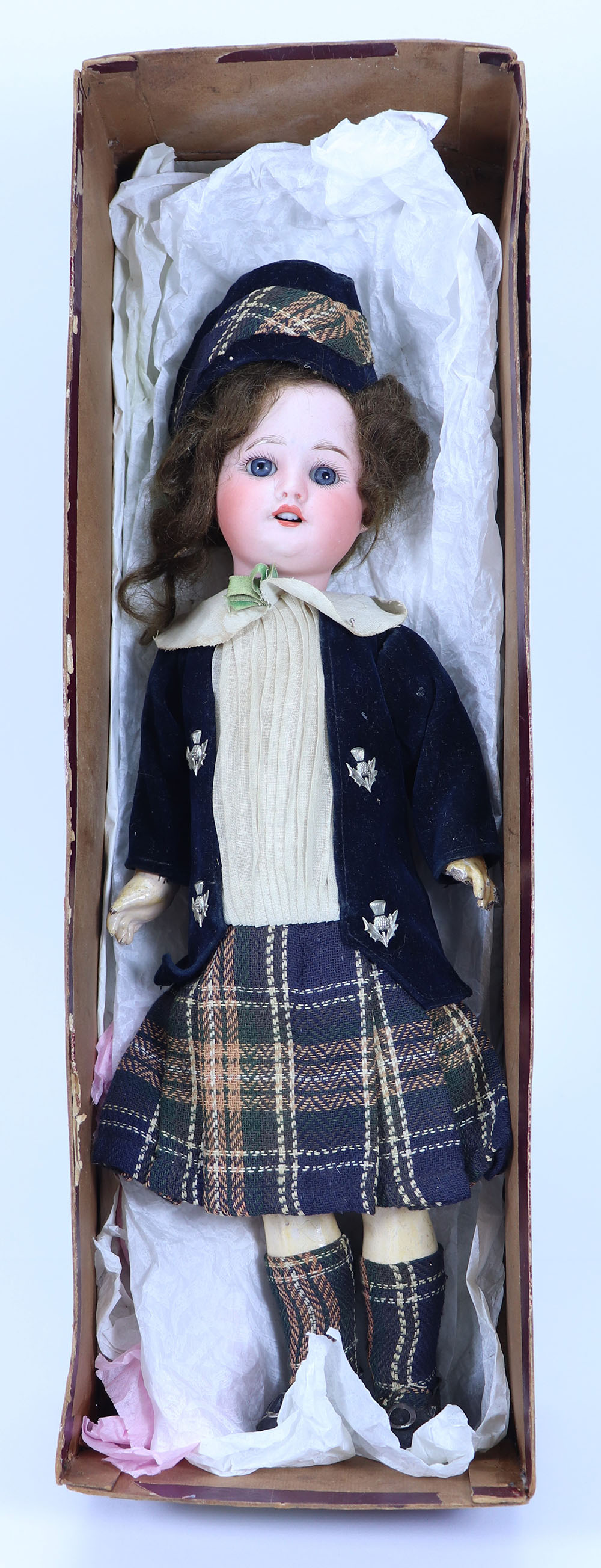 An S.F.B.J 60 bisque head doll in original Scottish clothes, French circa 1915