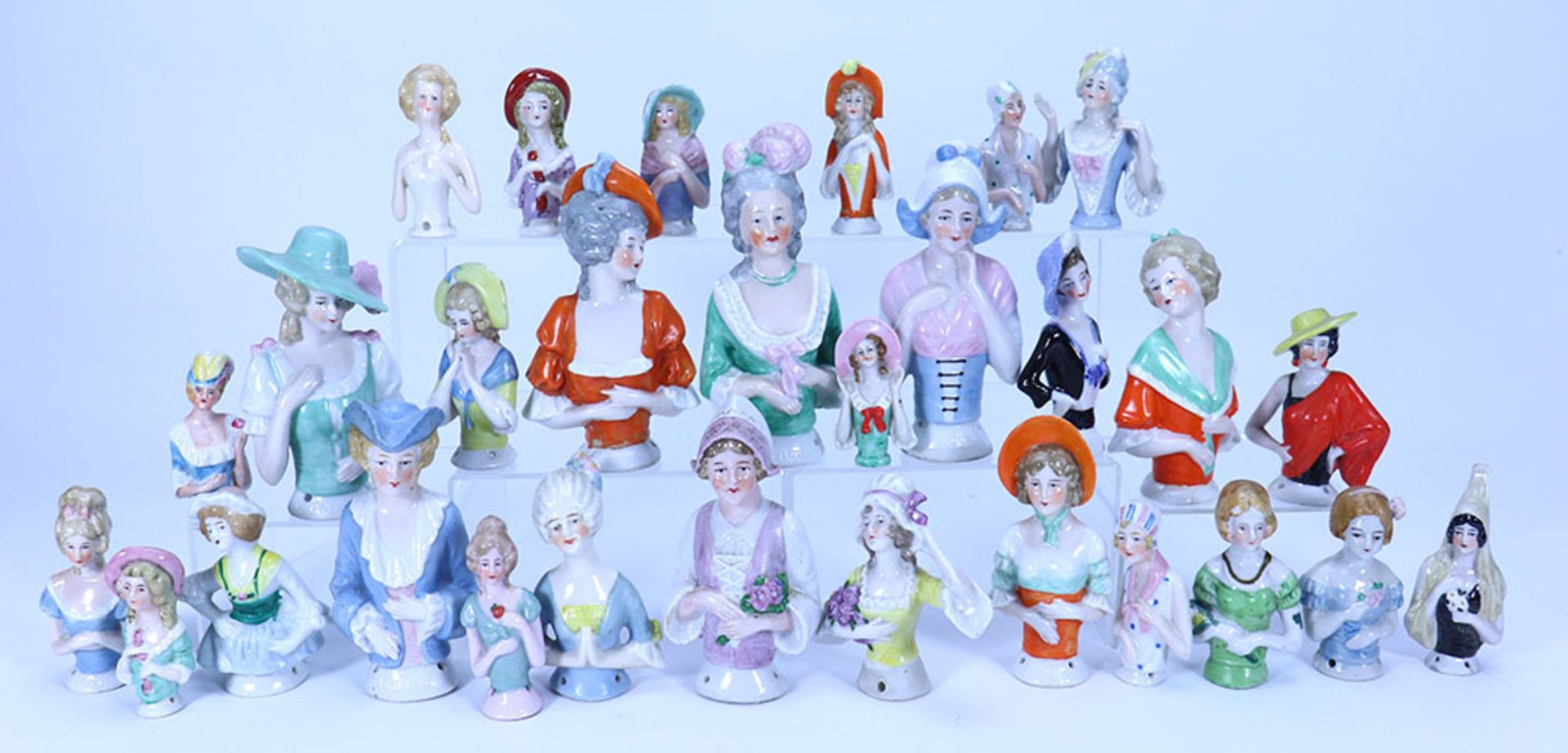 Collection of thirty glazed China Half-Dolls, German 1920s,