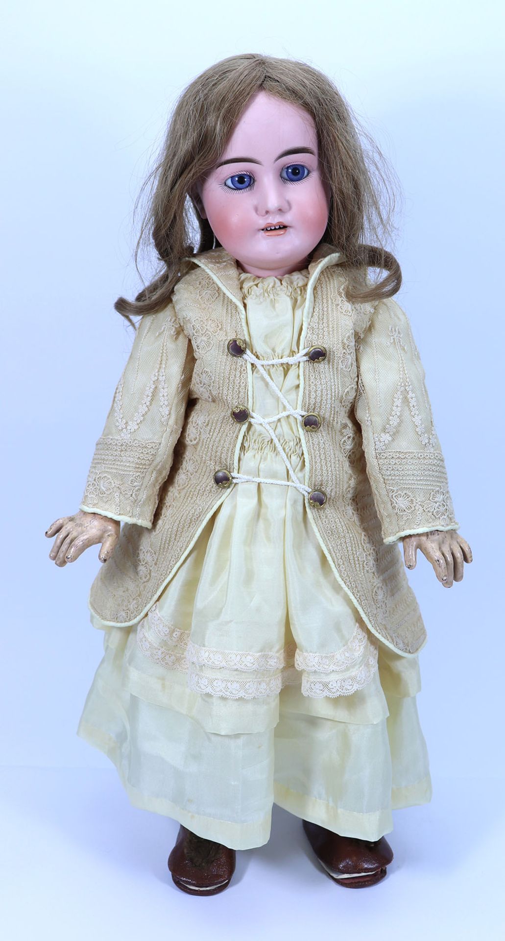 A Gebruder Kuhnlenz bisque head doll, German circa 1910,