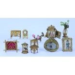 A good selection of gilt metal Dolls House furniture and ornaments, German 19th century,
