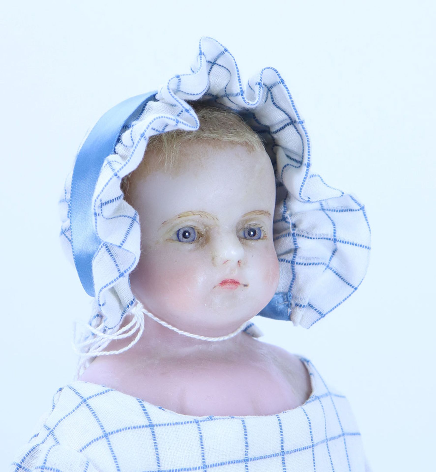 A Pierotti poured wax shoulder head doll, English circa 1860,