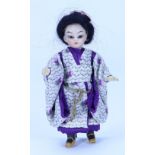 A miniature Simon & Halbig Asian doll in original clothes, German circa 1910,