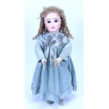 A figure A bisque head Steiner Bebe bisque head doll, size 11, French circa 1890,