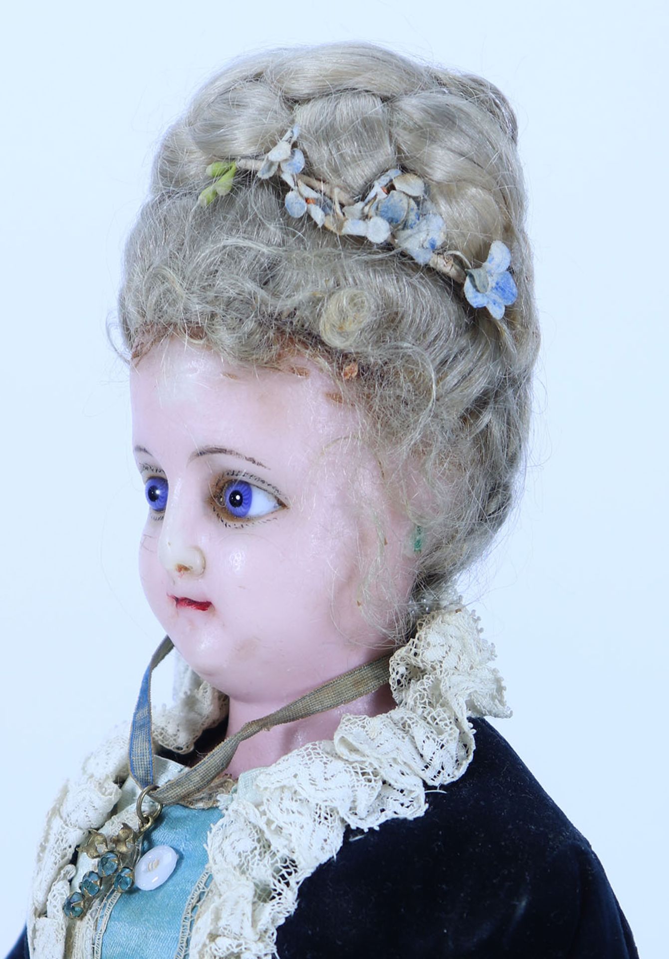 A ‘Queen Alexandra’ portrait wax over composition shoulder head doll, German circa 1905,