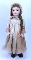 A reproduction Calli-Lou bisque head Bebe doll, 1981,