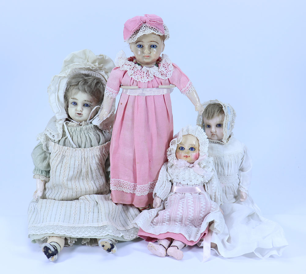 Four German wax over composition dolls,