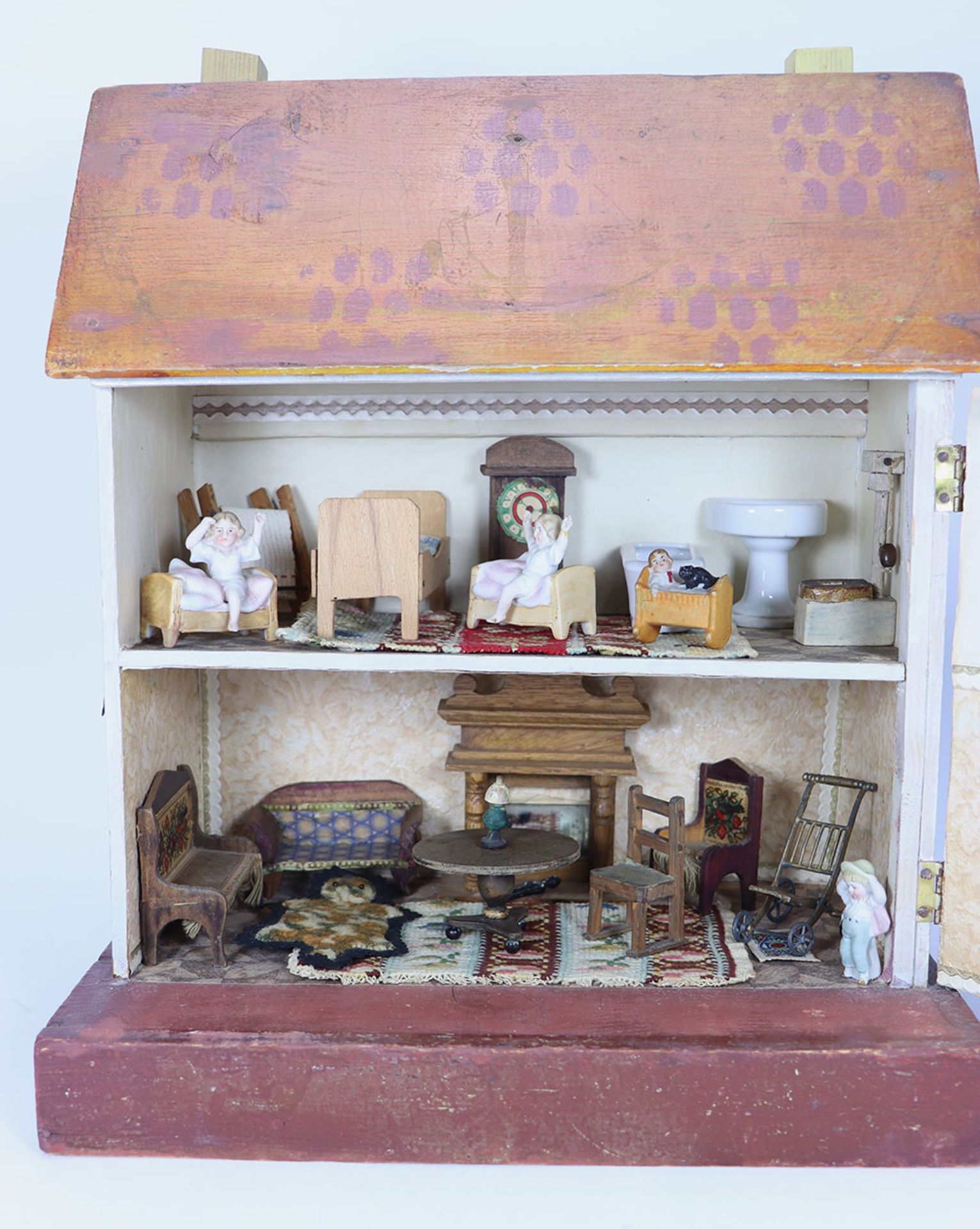 A D.H Wagner & Son painted wooden dolls house with contents, German 1920s-30s, - Image 2 of 2