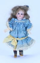 A miniature all original Simon & Halbig bisque head doll, German circa 1910,