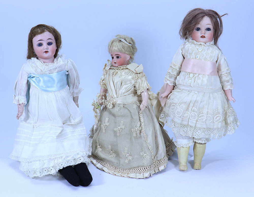 A small all original bisque shoulder head doll dressed as a bride, German circa 1910,