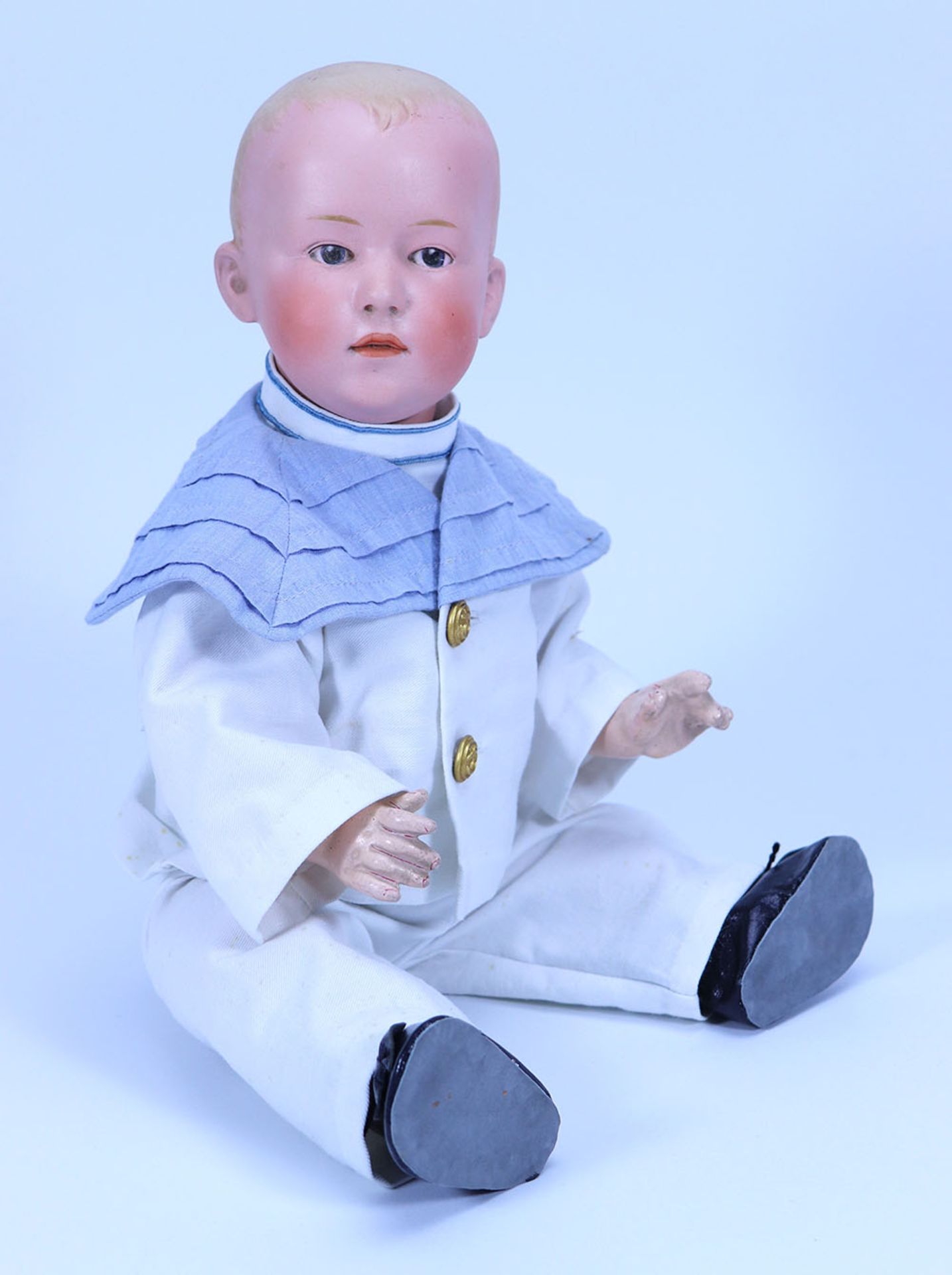 A large Gebruder Heubach ‘Pouty’ bisque head baby doll, German circa 1910,