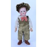 A bisque head ‘Tommy Tucker’ type character doll, German circa 1910,