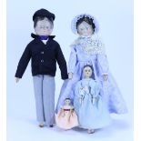 A family of four peg wooden dolls,