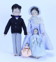 A family of four peg wooden dolls,