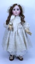 A beautiful and rare Jumeau Triste bisque head Bebe doll, size 13, French circa 1882,