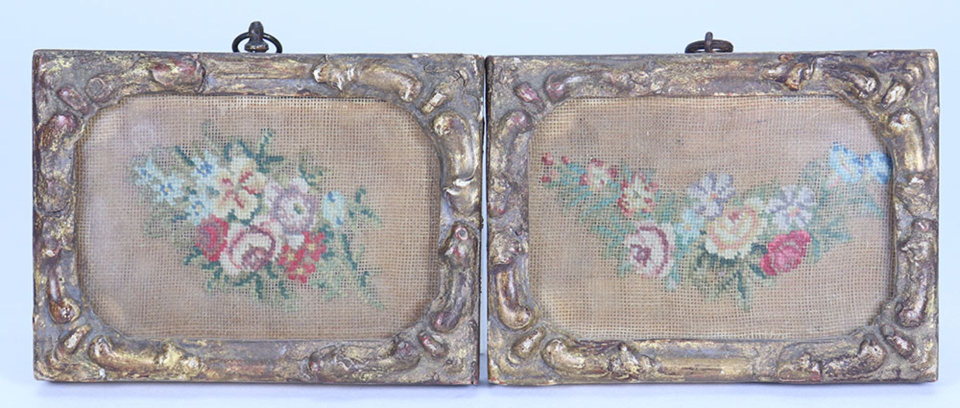 A pair of miniature 19th century embroidery pictures,