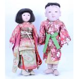 Eleven traditional Japanese papier-mache festival dolls,