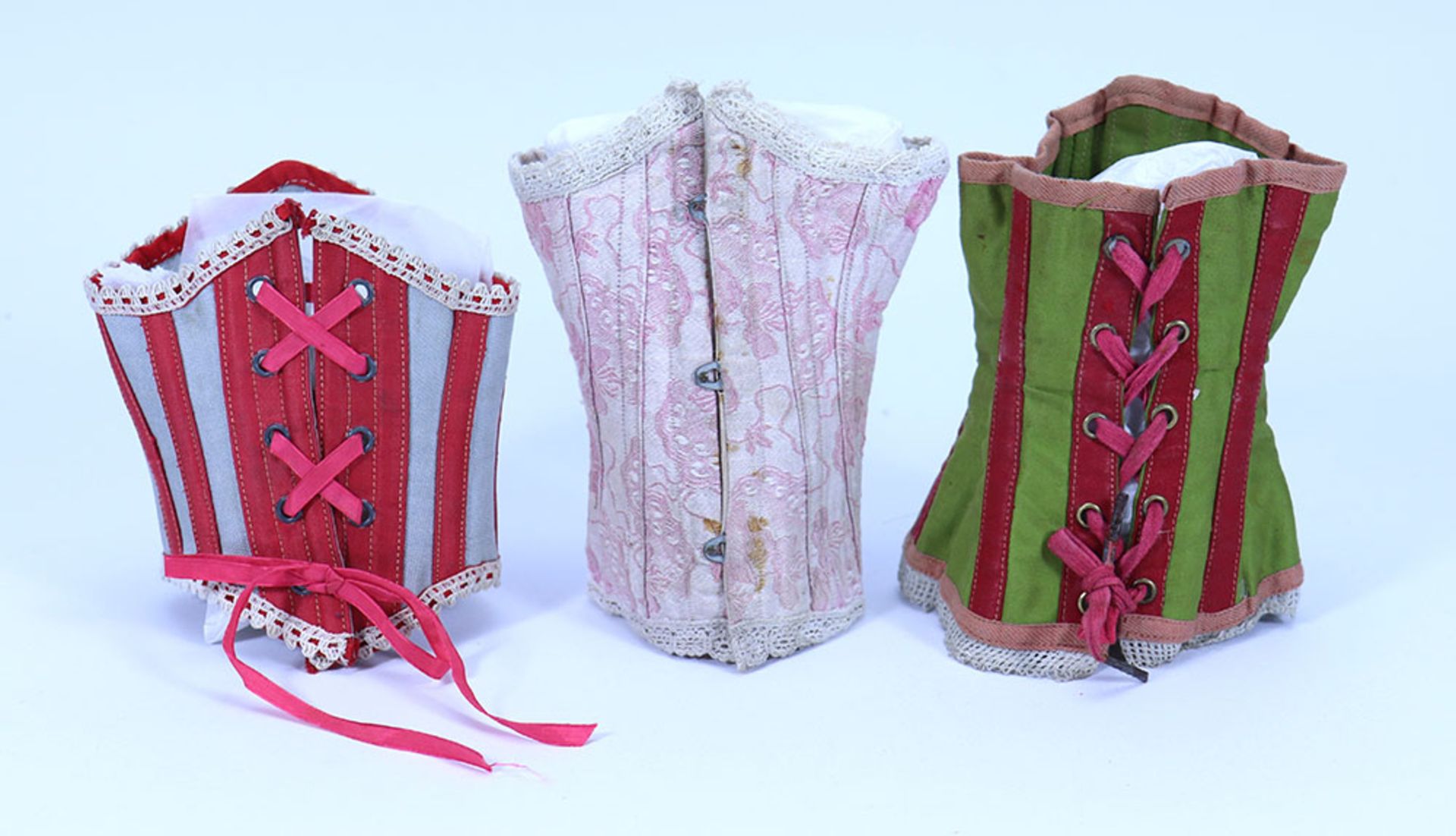 Three good dolls corsets, circa 1890s,