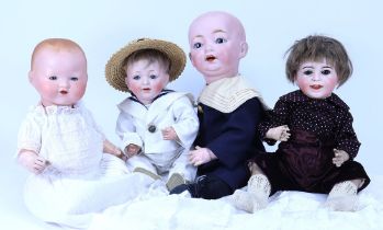 Four various bisque head baby dolls,