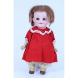 A small all original A.M 323 bisque head googly eyed doll, German circa 1915,