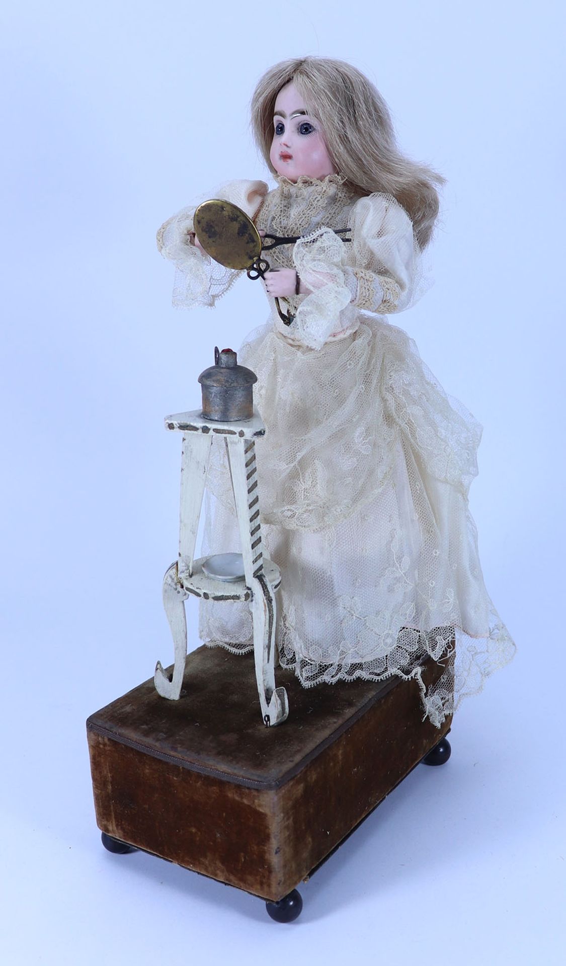 A Renou Little Girl with mirror and hair tongs Automata, French 1890s,