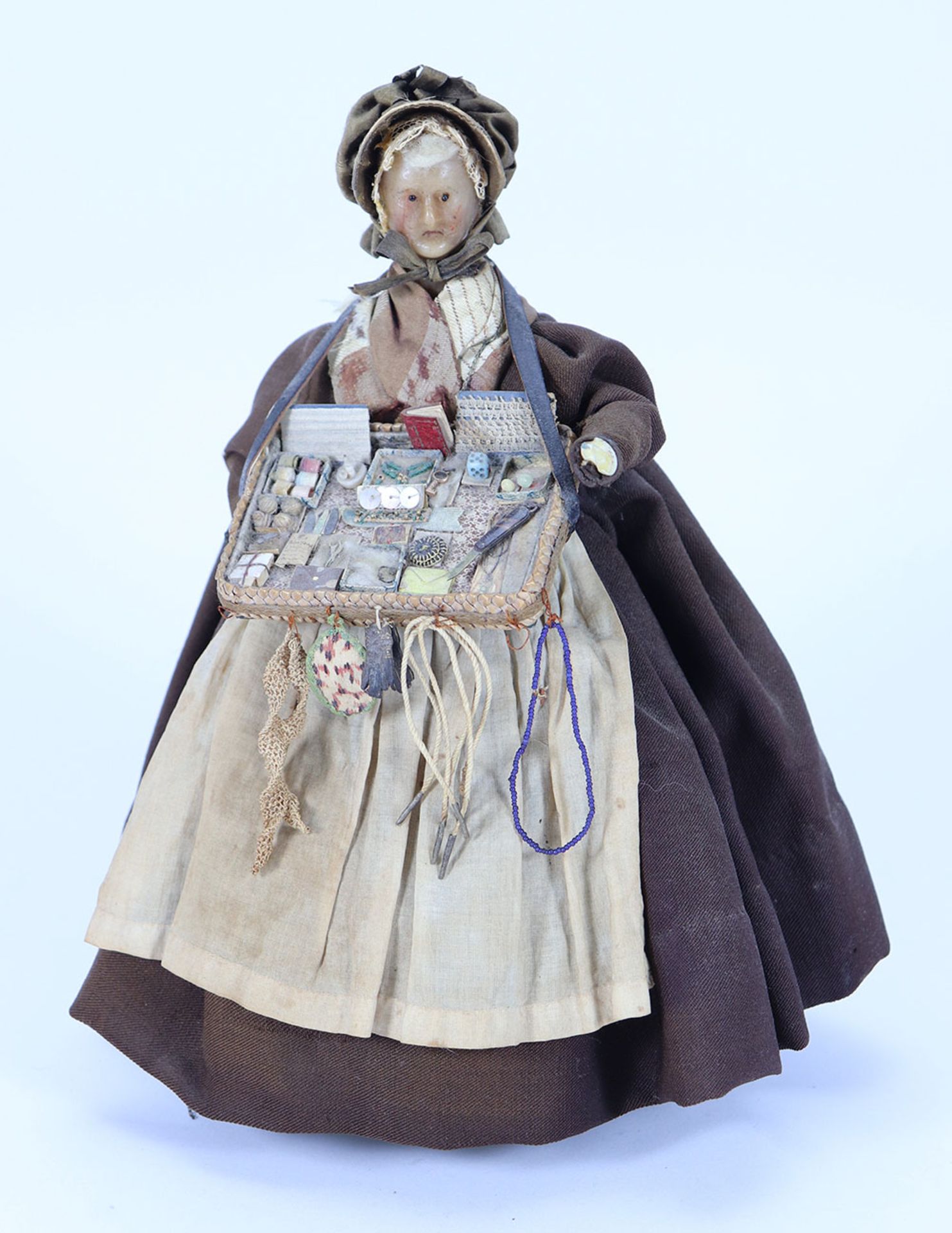 All original early bees wax pedlar doll on wooden jointed body, German 1830s,