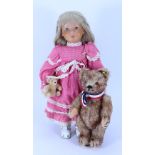 Steiff doll Lore with her miniature bear, circa 1990,