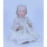 A large Gebruder Heubach 7977 ‘Baby Stuart’ bisque head baby doll, German circa 1910,