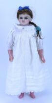 A Montanari poured wax shoulder head doll, English 1860s,