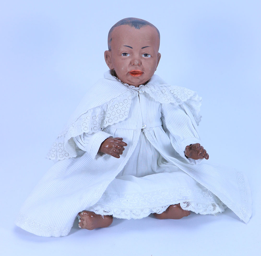 A Kammer & Reinhardt 100 brown bisque head character baby doll, German circa 1910,