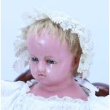 A Pierotti poured wax shoulder head baby doll, English 1860s,
